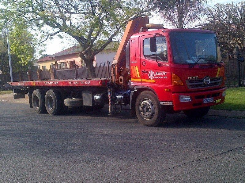 12 Ton roll back truck with crane to hire