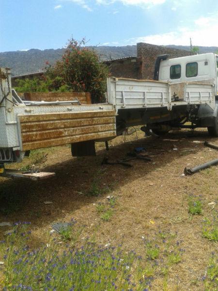 Ford cargo 1517 flatbed bak for sale. 6.2 meters with drops sides