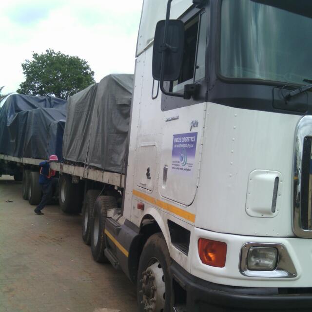 International truck 9800i and superlink flatdeck trailer