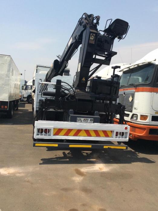 Mercedes Benz f/deck with blue crane for sale