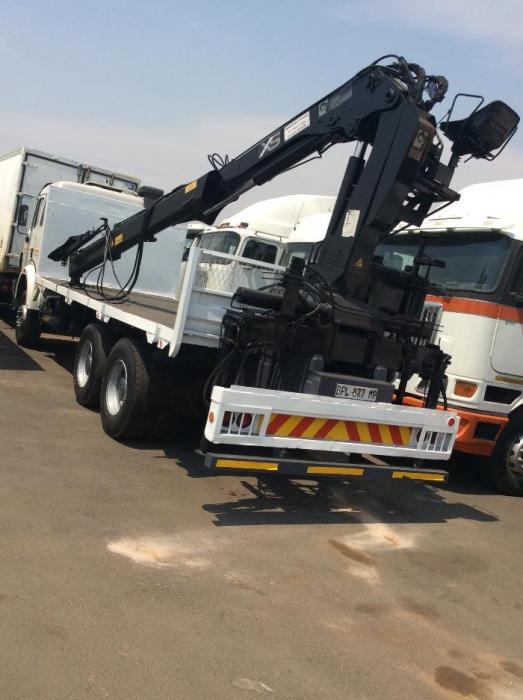 Mercedes Benz f/deck with blue crane for sale
