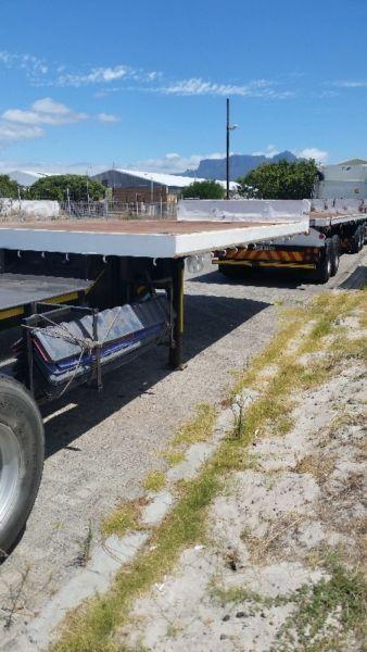 1999 12m and 2002 6m flatdeck trailer combination