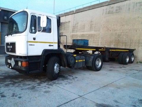 MAN 407 turbo with 12m flat bed and a 6m trailer