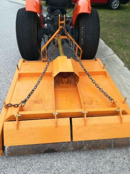 Kubota tractor with bush cutter