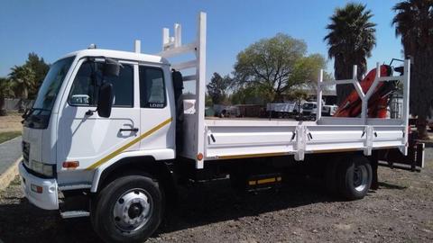 Very clean Nissan UD80 dropside truck with palfinger PK12000 crane