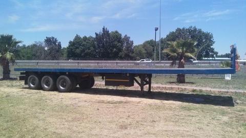 Bargain Triaxle flatdeck trailer 